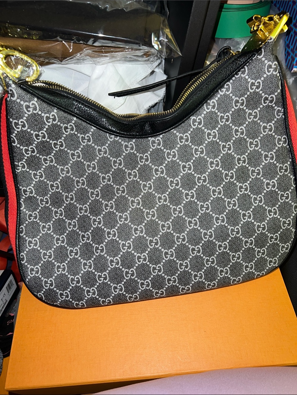 Black Monogram Shoulder Bag with Red Trim and Gold Hardware
